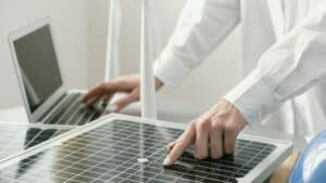 close up hand typing laptop